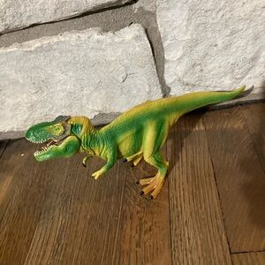 Unbranded Green and Yellow Dinosaur Toy with moveable jaw